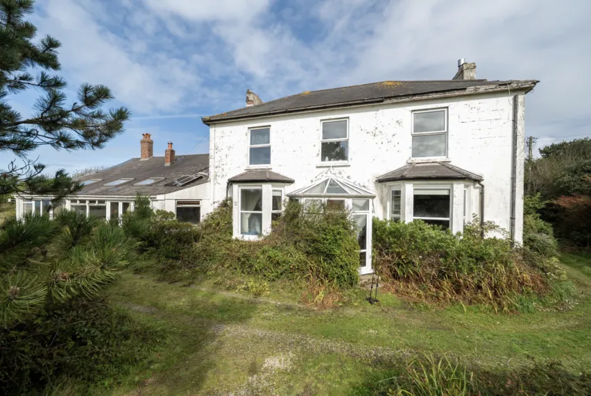 Kenython House is a large white detached property for auction with Clive Emson Auctioneers on 5th November