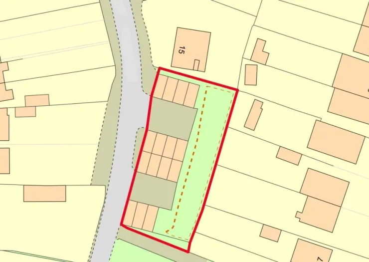 Property site map with buildings outlined in red.