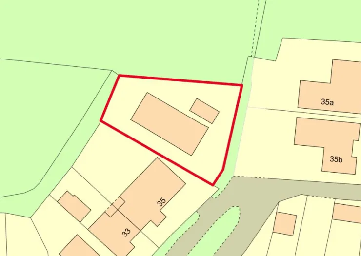Property plat map highlighting a specific parcel in red outline.