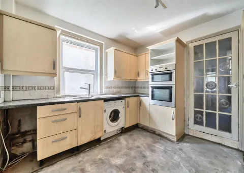 kitchen interior with sand colour units