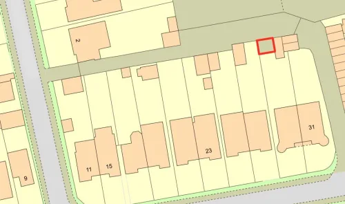 Simple street map with a red-outlined property highlighted.