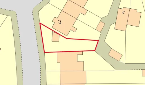 Property plat map with a red outline highlighting a specific plot.