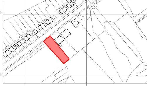 Land plot highlighted in red on a site map.